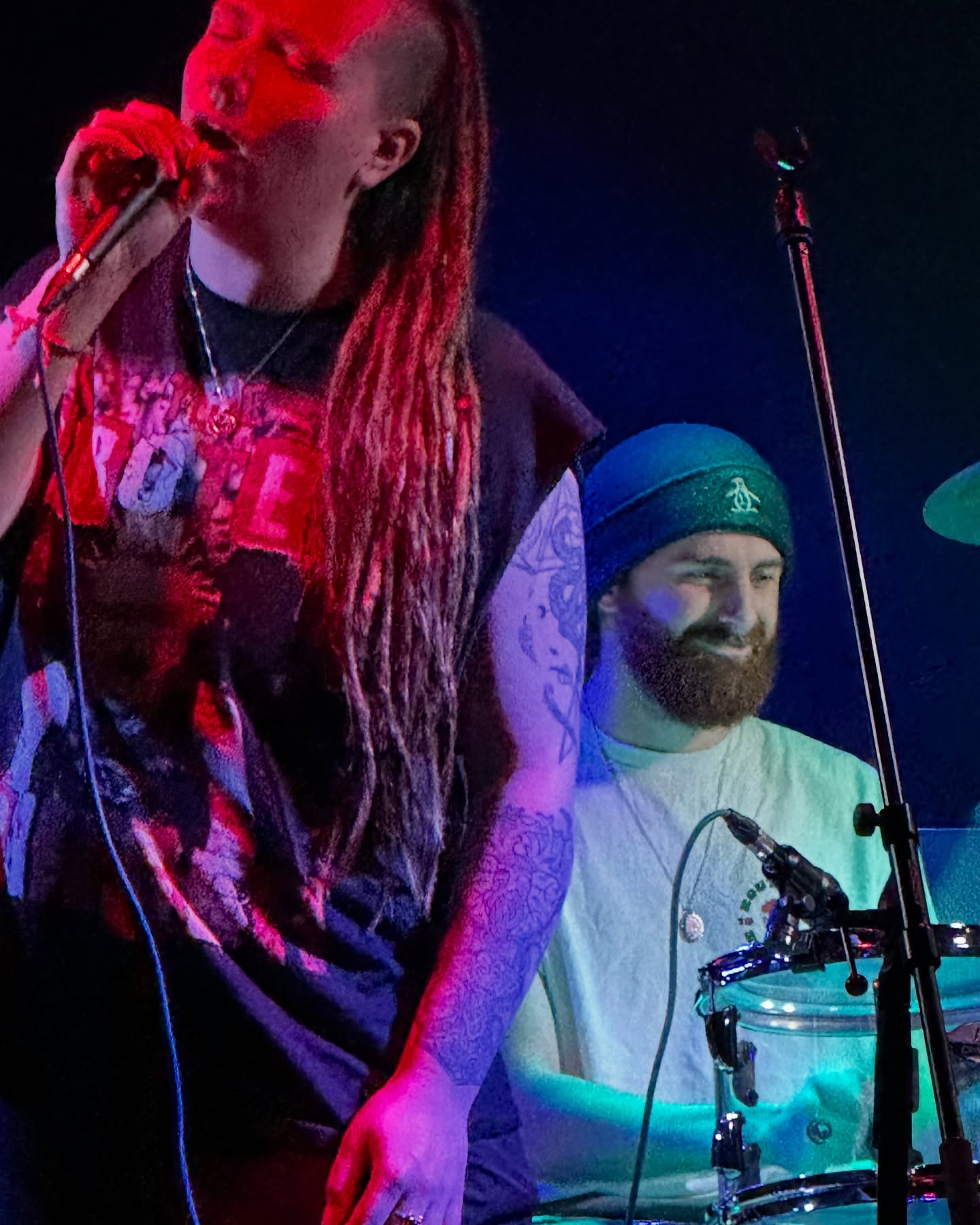 Rebel and the Banned on stage with red lighting